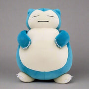 Pokemon Plush: Snorlax - Soft plush Snorlax figure in teal and cream with closed eyes and rounded body.