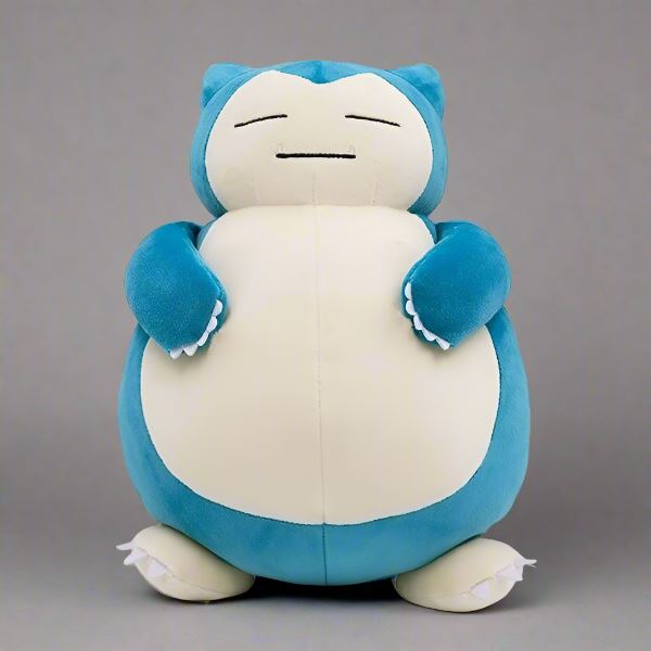 Pokemon Plush: Snorlax - Soft plush Snorlax figure in teal and cream with closed eyes and rounded body.