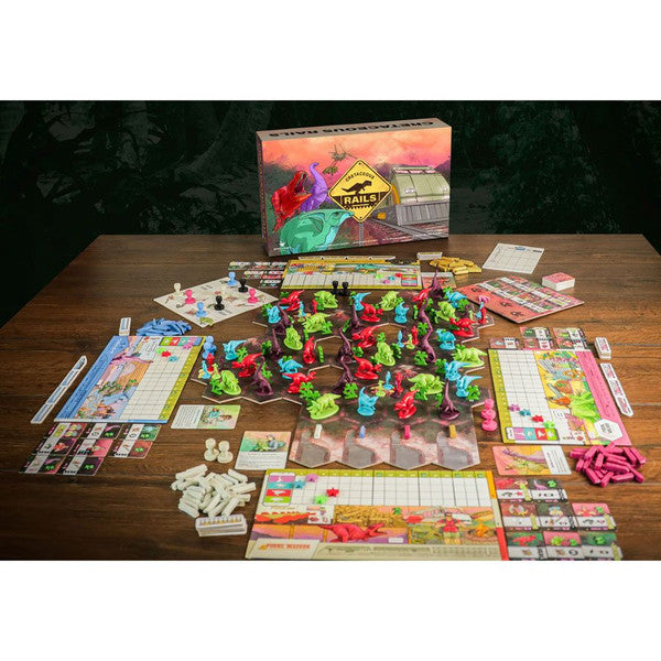 Cretaceous Rails - Board game setup with colorful dinosaur miniatures, hexagonal terrain tiles, player boards, cards, and tokens on a wooden.