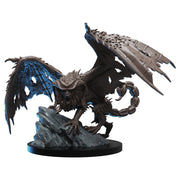 Epic Encounters: Cave of the Manticore - Detailed black and blue manticore miniature on a rocky base with torn wings and a spiked tail.