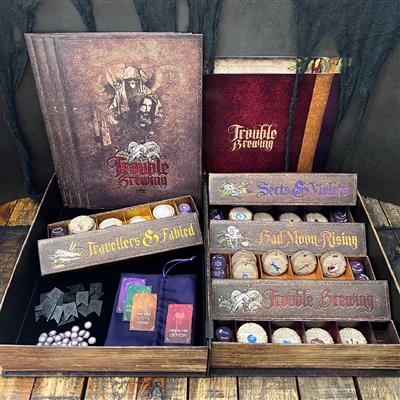 Blood on the Clocktower - Blood on the Clocktower game box with dark, ornate cover art, divided wooden tray containing cards, tokens, and custom dice.