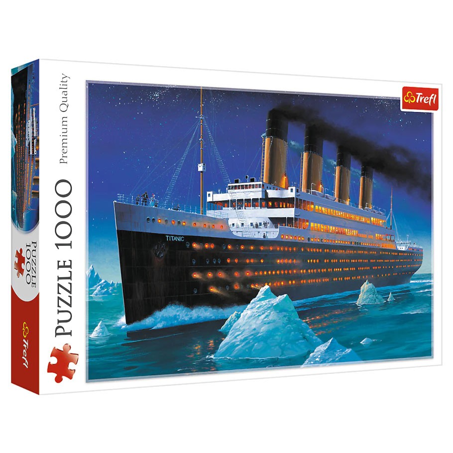 Titanic 1000 Piece Puzzle - Titanic 1000-piece puzzle box featuring an illustrated nighttime view of the Titanic ship sailing near icebergs under a dark