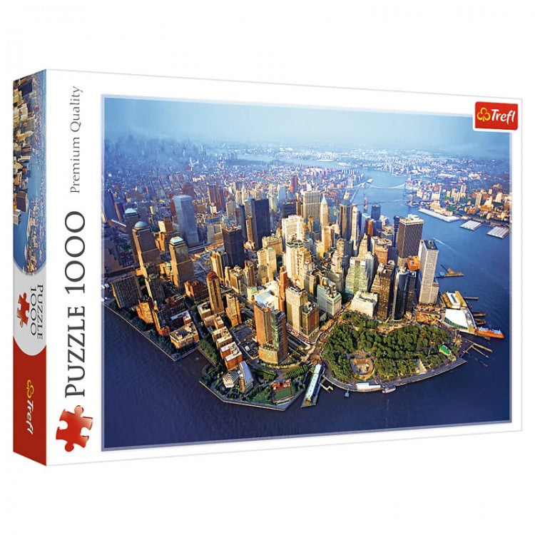 Puzzle: New York 1000pc - 1000-piece jigsaw puzzle featuring aerial view of New York City skyline with skyscrapers and waterfront.