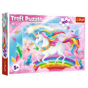 Crystal World of Unicorns 100 Piece Puzzle - Colorful 100-piece puzzle featuring a white unicorn with a rainbow mane and tail, standing on a rainbow with crystal and.