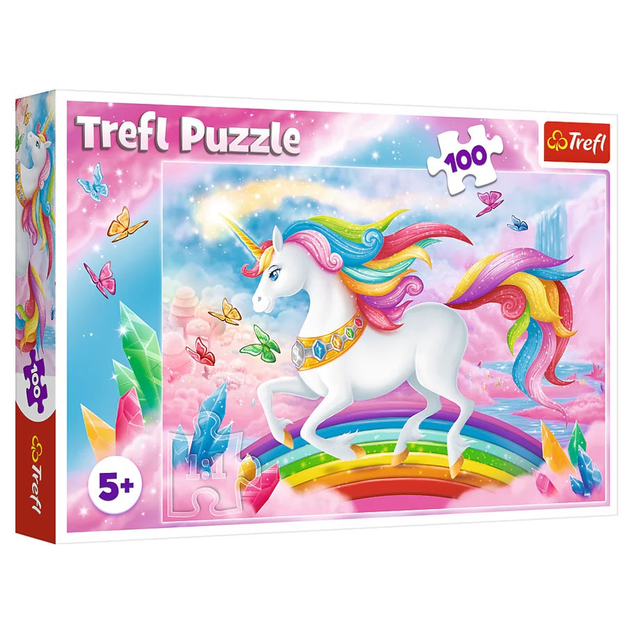 Crystal World of Unicorns 100 Piece Puzzle - Colorful 100-piece puzzle featuring a white unicorn with a rainbow mane and tail, standing on a rainbow with crystal and.