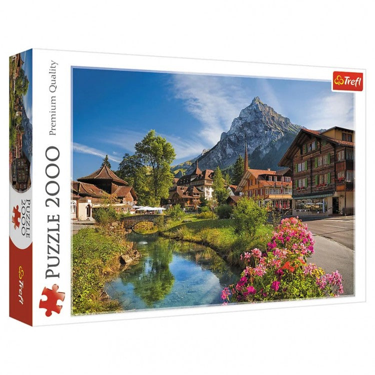Puzzle: Alps in the Summer 2000pc - 2000-piece puzzle featuring a vibrant summer Alps village scene with mountains, greenery, and flowers.