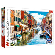Murano Island, Venice 2000 Piece Puzzle - 2000-piece puzzle box featuring a colorful Venice canal scene with boats and historic buildings.