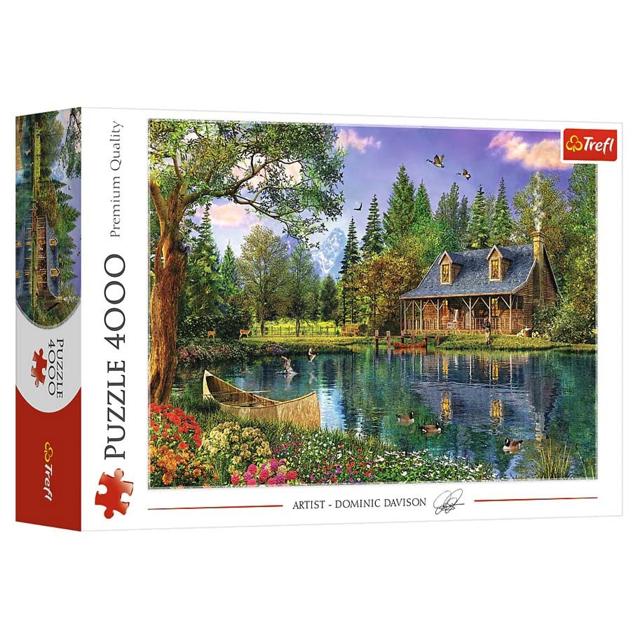 Afternoon Idyll 4000 Piece Puzzle - 4000-piece puzzle box featuring a serene lake scene with a rustic cabin, trees, and a canoe.