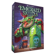 Emerald Skulls - Board game box with vibrant artwork featuring a green goblin holding glowing emerald cubes with skull symbols on a purple.