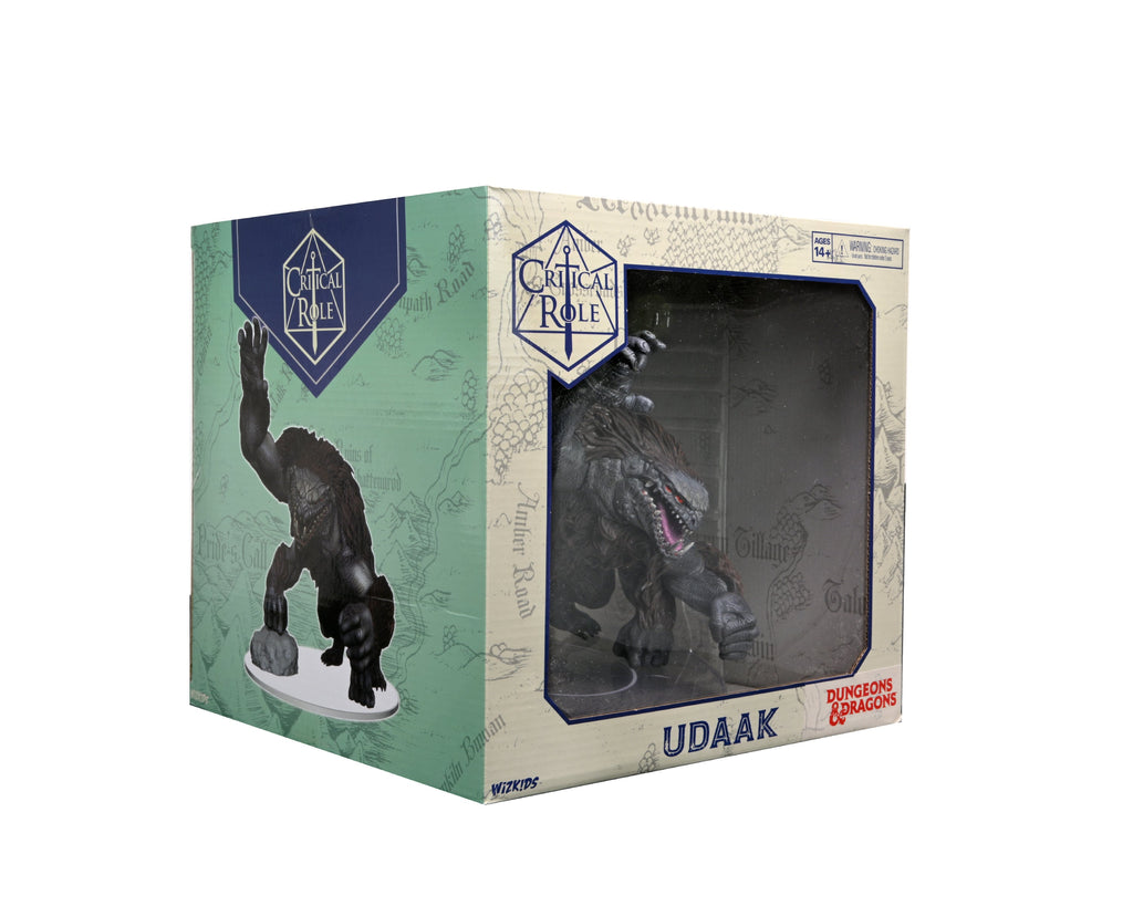 Critical Role Mini: Monsters of Wildemount - Udaak Premium Figure - Udaak figurine in dark tones with glowing purple accents, encased in green and beige box with clear window and Critical Role