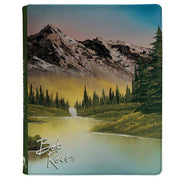 UP 9-Pocket Binder: PRO: Bob Ross: Mountain Retreat - Binder cover featuring a serene mountain landscape with snow-capped peaks, pine trees, and a reflective lake in soft sunset.