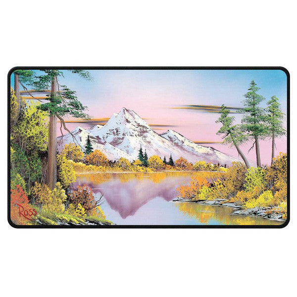 Ultra Pro Playmat: Stitched Edge: Bob Ross: Mighty Mountain Lake - Rectangular playmat with stitched black edges featuring a colorful mountain lake landscape with snow-capped peaks, trees,.