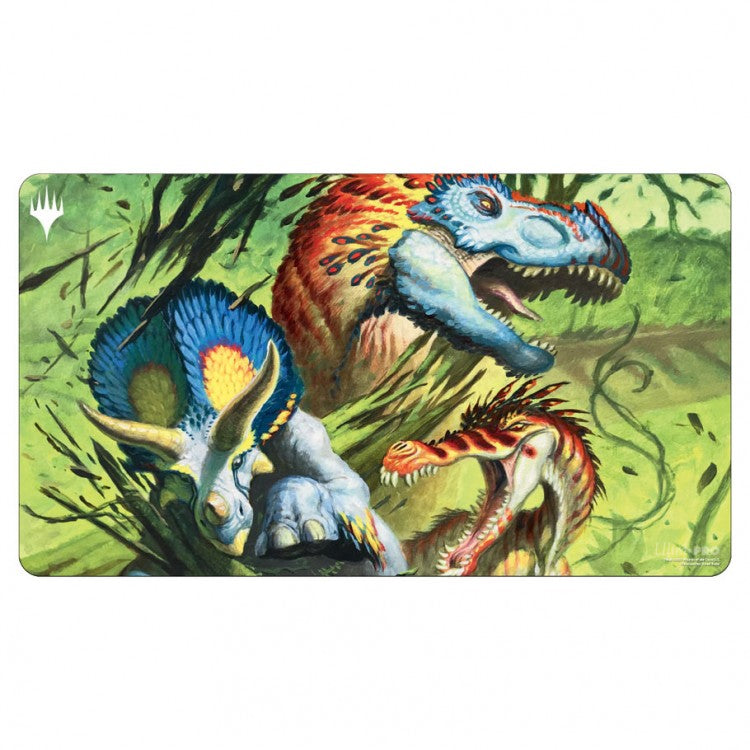 Ultra Pro Playmat -Magic the Gathering: Commander Masters: Finale of Devastation - Rectangular playmat featuring vibrant dinosaurs with bright blue, red, and orange tones on a green jungle background.