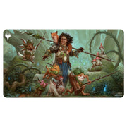 Ultra Pro Playmat - Wilds of Eldraine - Ellivere - Playmat featuring a fantasy forest scene with a warrior woman and whimsical creatures in vibrant colors.
