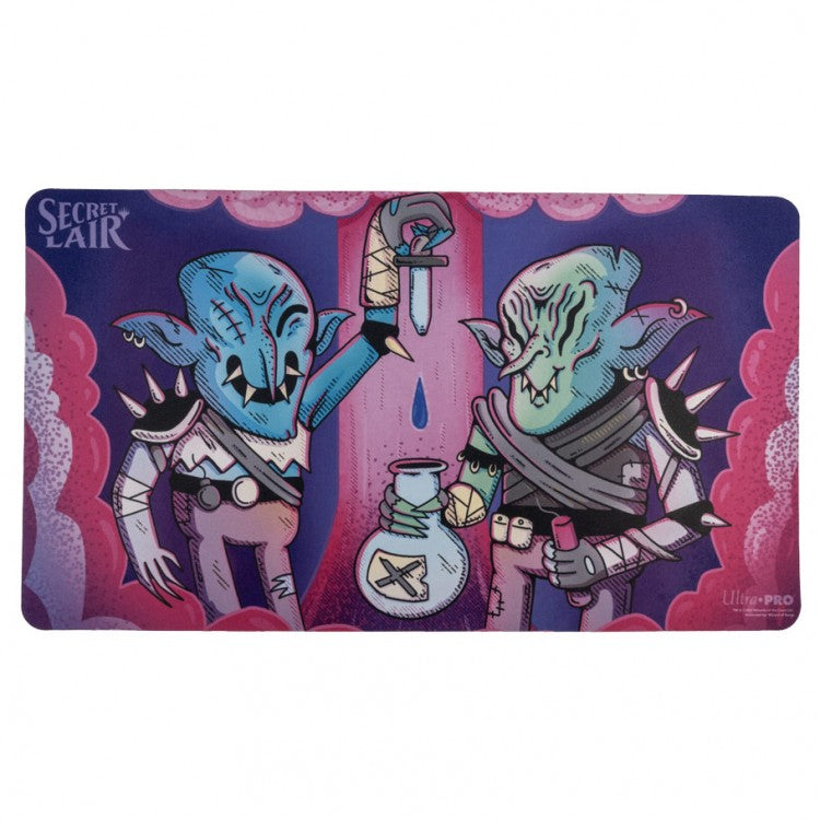 Ultra Pro Playmat -Magic the Gathering: Secret Lair: Shattergang Brothers - Rectangular gaming playmat featuring two cartoonish blue-skinned goblin characters holding potions, set against a purple and