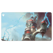 Playmat: Magic the Gathering: Ravnica Remastered: Izzet League - Rectangular playmat featuring a fantasy tower with red domes, metal structures, and blue lightning bolts against a cloudy.