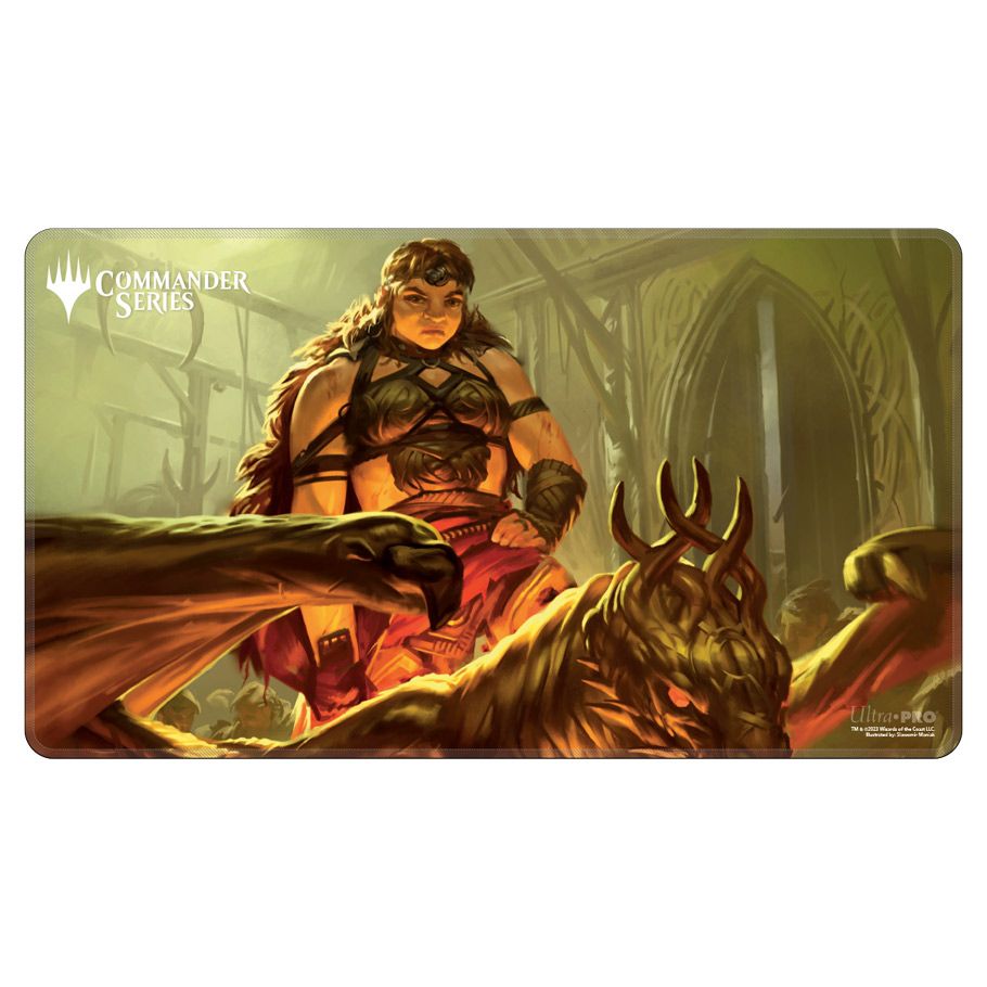 Playmat: MtG: Commander Series: Magda, Brazen Outlaw - Rectangular playmat featuring a fierce female warrior in dark armor wielding a large hammer, with a fiery, horned beast.