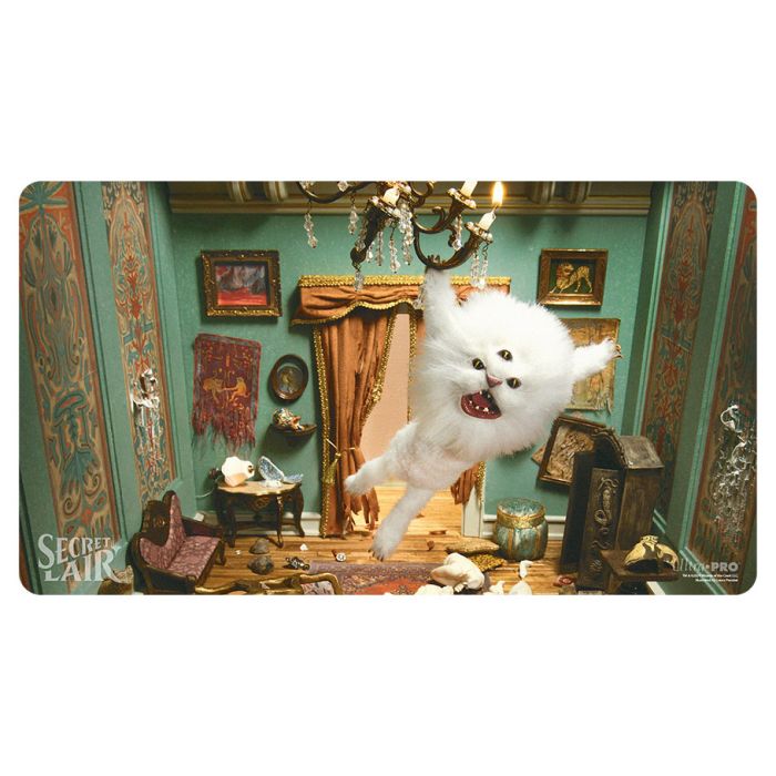 Playmat: Magic the Gathering: Secret Lair: Diabolical Dioramas: Aura Shards - Rectangular playmat featuring a detailed, colorful diorama of a vintage room with teal walls, ornate gold trim, antique.