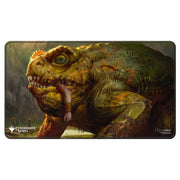 Playmat: Magic the Gathering: Commander Series: Stitched Edge: The Gitrog Monster - Rectangular gaming playmat featuring a detailed green and brown frog-like monster with yellow eyes and sharp teeth, stitched