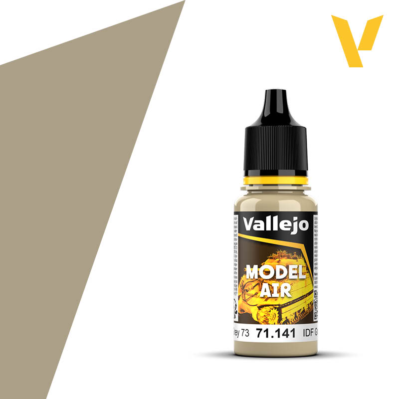 Vallejo Model Air: IDF Sand Grey 73 (18m) - Small plastic bottle of Vallejo Model Air paint in IDF Sand Grey color with black cap and yellow accents.