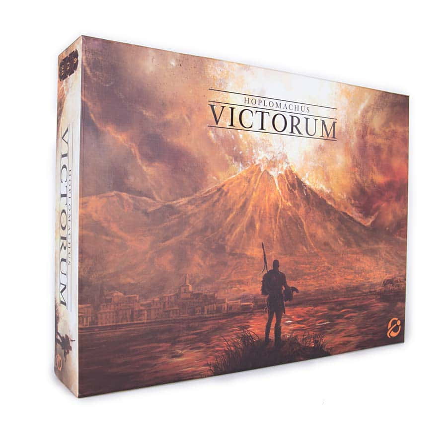 Hoplomachus: Victorum - Board game box with dramatic volcanic eruption artwork and lone warrior figure in dark silhouette.