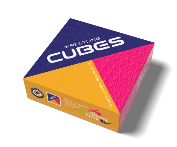 Wrestling Cubes - Triangular box with navy blue, yellow, and pink panels, featuring bold white "Wrestling Cubes" text and tactile hexagon.