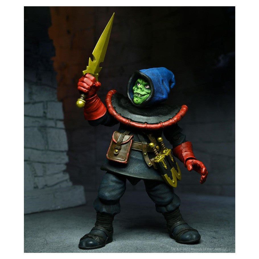 D&D: 7" Action Figure: Ultimate Zarak - 7" action figure of a green-skinned goblin warrior wearing a blue hood, red gloves, and black boots, holding a yellow sword.