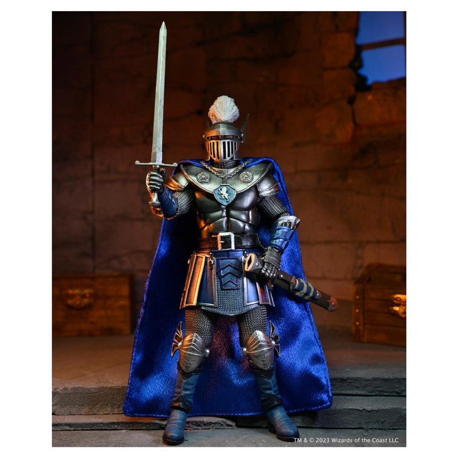 D&D: 7" Action Figure: Ultimate Strongheart - 7-inch articulated knight action figure in silver armor with blue cape and sword raised upright.