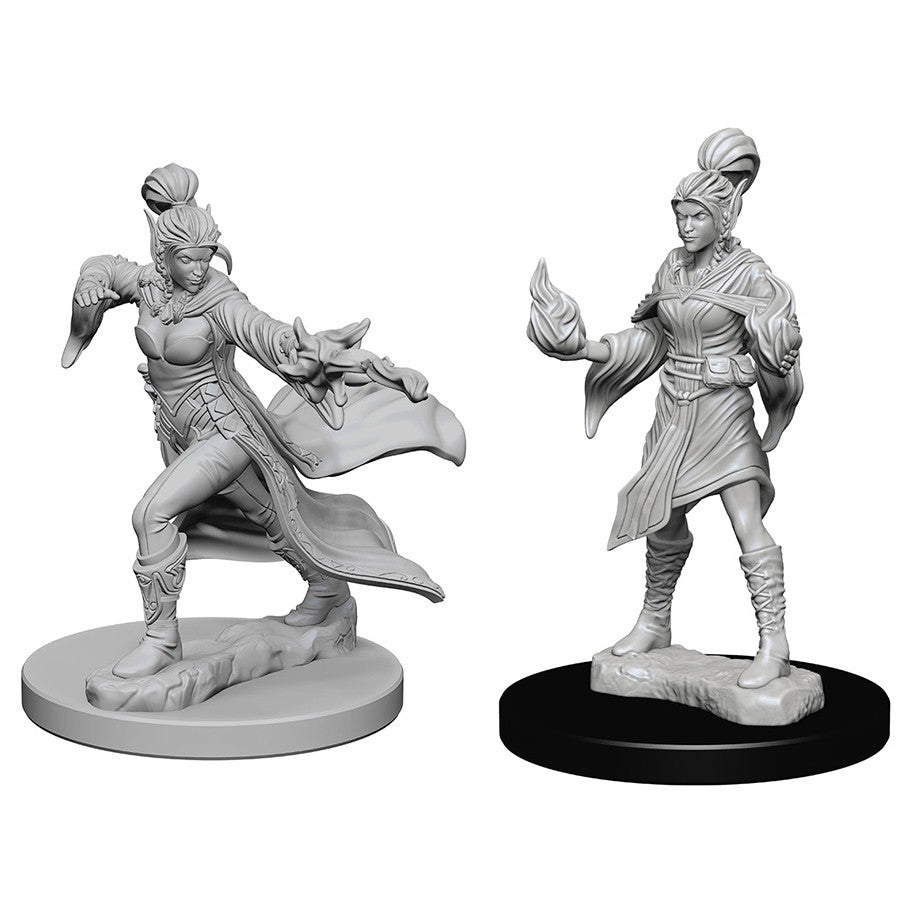 Pathfinder Deep Cuts: Elf Female Sorcerer W1 - Two unpainted gray resin miniatures of female elf sorcerers, one poised dynamically with flowing cloak, the other standing.