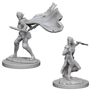 Pathfinder Battles Deep Cuts: Elf Female Rogue W4 - Gray plastic miniature of a female elf rogue in dynamic pose with flowing cape and dagger.