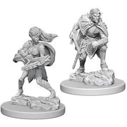 D&D Nolzur's Marvelous Miniatures: Drow - Two unpainted gray plastic fantasy miniatures of a female drow warrior with a crossbow and a male drow rogue with a sword.
