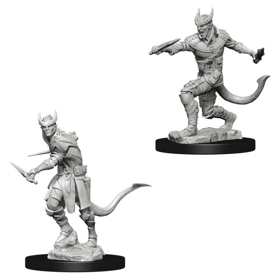 Dungeons & Dragons: Nolzur's Marvelous Minis: Tiefling Male Rogue - Unpainted gray resin mini of a male Tiefling rogue with horns, a tail, daggers, and crouching pose on a round base.