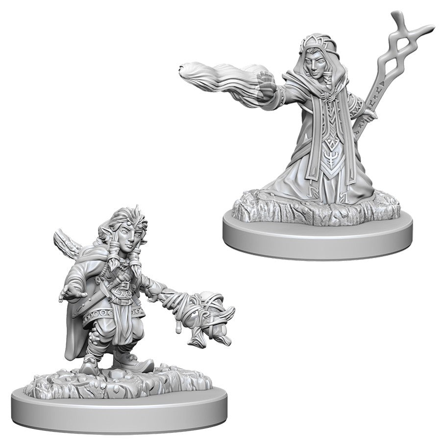 D&D: Nolzur's Marvelous Minis: Female Gnome Wizard W6 - Unpainted female gnome wizard miniature in dynamic pose holding a fireball in one hand and a staff in the other, detailed.