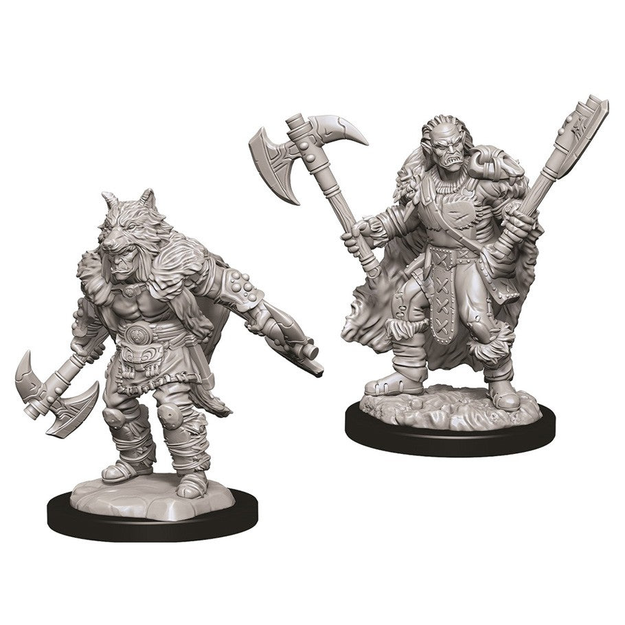 D&D Nolzur's Marvelous Minis: Male Half Orc Barbarian - Two unpainted gray resin miniatures of male half-orc barbarians, one holding two axes, the other wielding a large axe and.