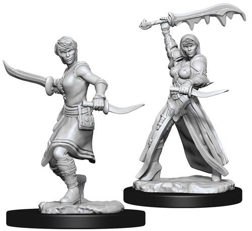 D&D Nolzur's Marvelous Miniatures: Female Human Rogue - Two unpainted gray plastic miniatures of a female rogue; one in a defensive stance holding curved daggers, the other raising
