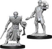 D&D Nolzur's Marvelous Miniatures: Male Human Warlock - Two unpainted gray plastic D&D miniatures, one male warlock with a skull staff and detailed armor, the other holding a fiery