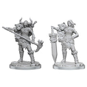 Dungeons & Dragons: Frameworks: Human Barbarian Female (PREORDER) - Two unpainted gray plastic miniature figures of female human barbarians; one wielding a large axe and wearing horned helmet.
