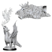 D&D Nolzur's Marvelous Miniatures: Gold Dragon Wyrmling & Small Treasure Pile - Unpainted gray plastic miniature of a young dragon with spread wings beside a detailed treasure pile with coins and gems.