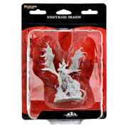 Pathfinder Battles Deep Cuts: Nightmare Dragon - Unpainted gray plastic miniature of a dragon with large wings and detailed scales on a round base in black and red blister.