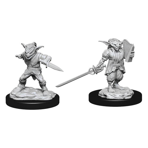 D&D Nolzur's Marvelous Minis: Goblin Rogue & Bard - A goblin rogue with dagger in a crouched stance and a goblin bard holding a sword and lute on round bases.