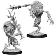 D&D Nolzur's Marvelous Miniatures: Gnoll Witherlings - Two unpainted grey plastic miniatures of gnoll creatures with spiky fur and skeletal features, each holding jagged weapons,.