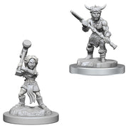 Dungeons & Dragons: Nolzur's Marvelous Minis: Halfling Barbarians - Two unpainted gray plastic miniatures of halfling barbarians, one wielding a raised hammer, the other holding a spiked club, .