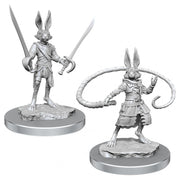 D&D Nolzur’s Marvelous Minis: Harengon Rogues - Two unpainted gray plastic miniature figures of anthropomorphic rabbit rogues, one wielding a sword and cutlass, the other.
