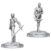 D&D Nolzur's Marvelous Miniatures: Drow Fighters - Two unpainted gray plastic miniatures of elven warriors, each standing on textured round bases, wielding swords and wearing.