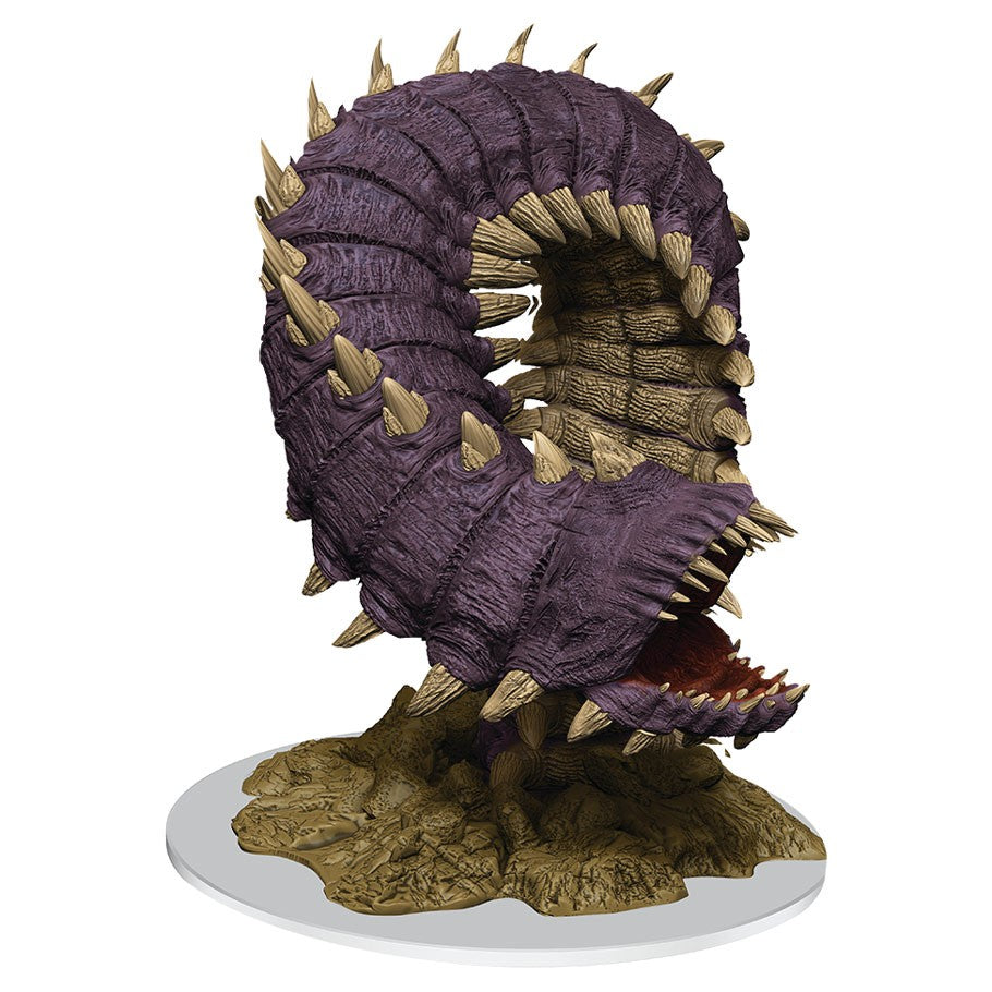 D&D: Nolzur's Marvelous Minis: Purple Worm - Purple segmented worm miniature with spiked beige accents and open maw on rocky base.