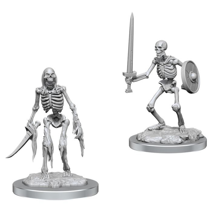 Wizkids Deep Cuts Miniatures: Skeletons - Two gray plastic skeleton miniatures, one wielding dual curved swords, the other holding a sword and round shield, on.
