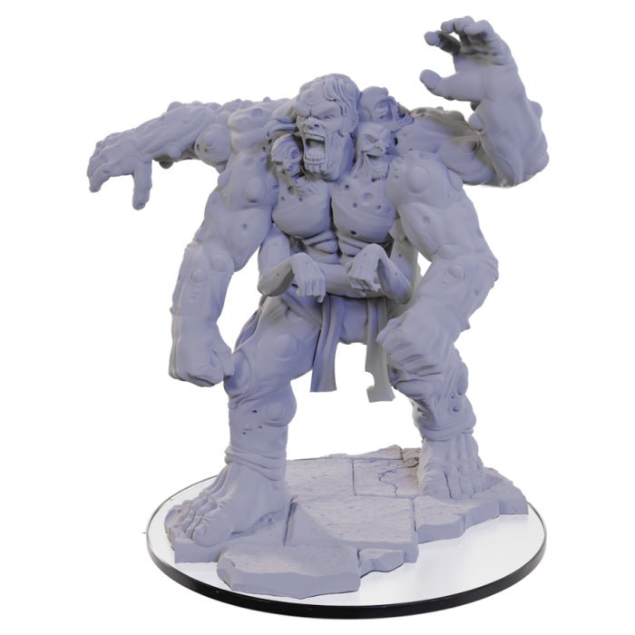 Critical Role Mini: Halas Flesh Golem - Unpainted pale gray resin mini with four muscular arms, stitched body, and menacing pose on textured circular base.