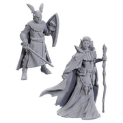 D&D: Nolzur's Marvelous Miniatures: Limited Edition 50th Anniversary: Elves - Two unpainted gray resin elf miniatures, one armored with sword and shield, the other robed holding a staff.