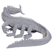 D&D Nolzur's Marvelous Miniatures: Classic Basilisk - Unpainted gray plastic basilisk miniature with detailed scales, curved tail, and forked tongue sticking out.