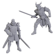 D&D Nolzur's Marvelous Miniatures: Special Edition Baldur's Gate 3: Ulder Ravengard & Zevlor - Two unpainted gray resin miniatures depicting armored fantasy warriors; one with bald head holding a sword, the other horned
